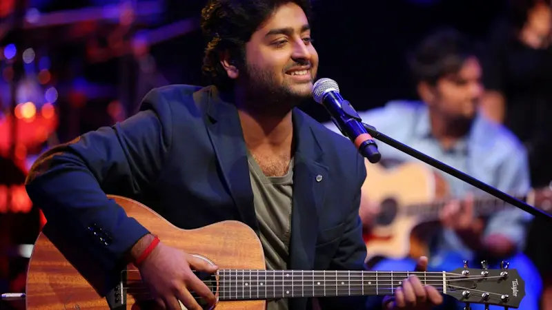 Arijit Singh, renowned Indian playback singer known for his emotional and melodious voice.