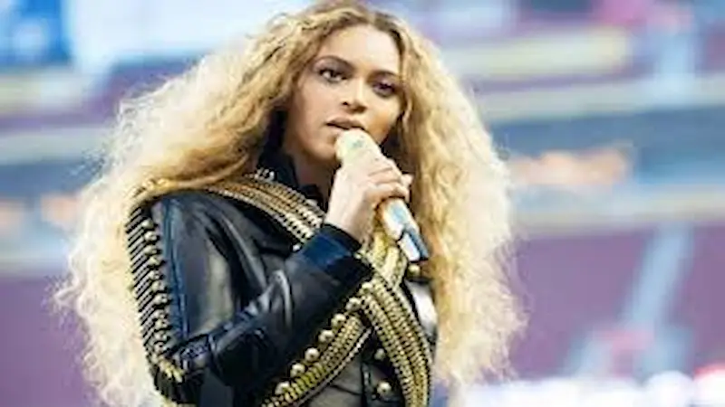 Beyoncé, the global icon of R&B and pop, known for her powerful vocals and chart-topping hits.