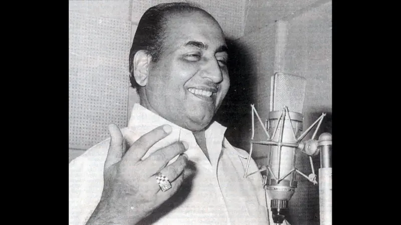 Mohammed Rafi, legendary Indian playback singer, known for his soulful voice and timeless hits like Kya Hua Tera Wada, Chaudhvin Ka Chand, and Baharon Phool Barsao.