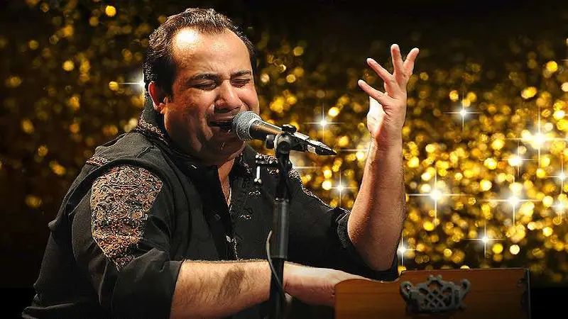 Rahat Fateh Ali Khan, legendary Pakistani Sufi and playback singer, known for his mesmerizing Qawwalis and Bollywood hits.